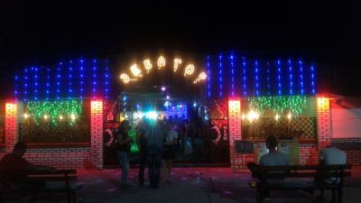 Equator club iron port - Equator club from the street at night