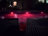 Mercure Hotel Duesseldorf Neuss - Wine glass by the pool illuminated in red