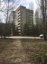 Pripyat day tour - visit of the abandoned city of Chernobyl nuclear disaster - Approaching a building