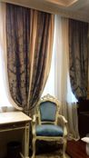 Royal Hotel De Paris - Fancy chairs and curtains
