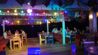 Bugaloe Beach Bar and Grill - Seating area at night