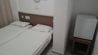 Princess Flora - Old room twin beds and fridge